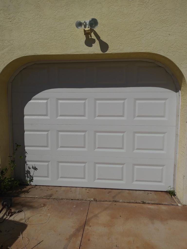 Sectional garage door installed on a Miami home