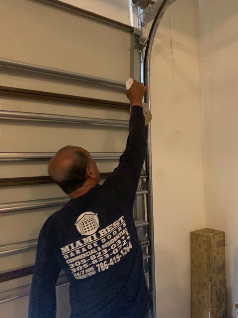 Replacement garage door panels on a completed job
